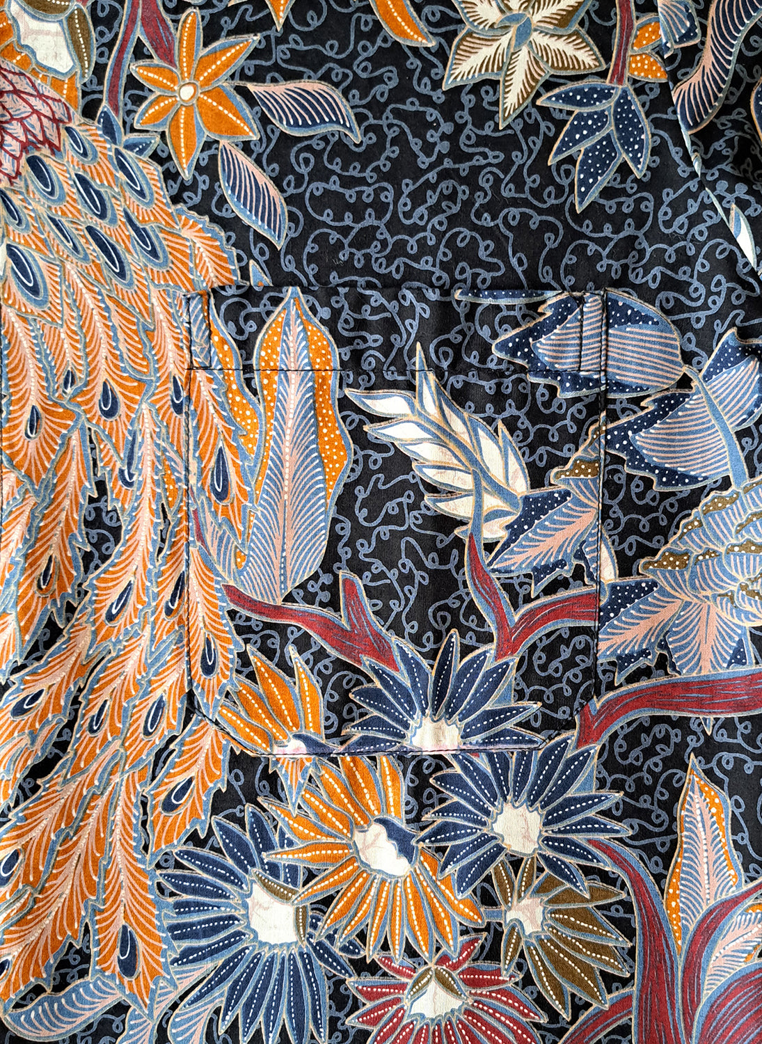 Singapore Modern batik shirts for men: Concealed pocket well tailored, unique prints. short sleeve Batik shirt. Phoenix Batik shirt.