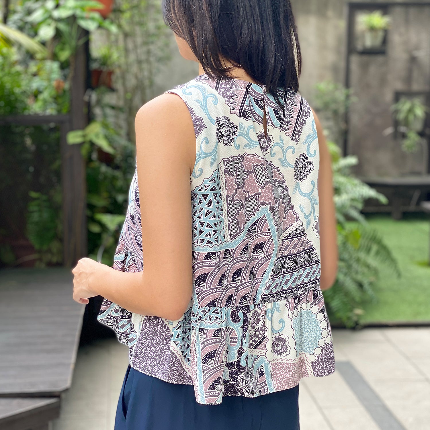 Modern Batik flowy sleeveless Top. Feminine, comfortable and beautiful Batik ladies Top in Singapore.