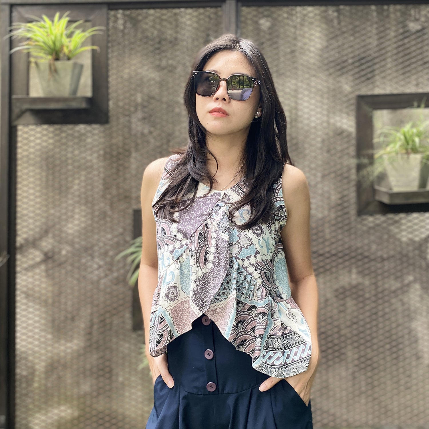Modern Batik flowy sleeveless Top. Feminine, comfortable and beautiful Batik ladies Top in Singapore.