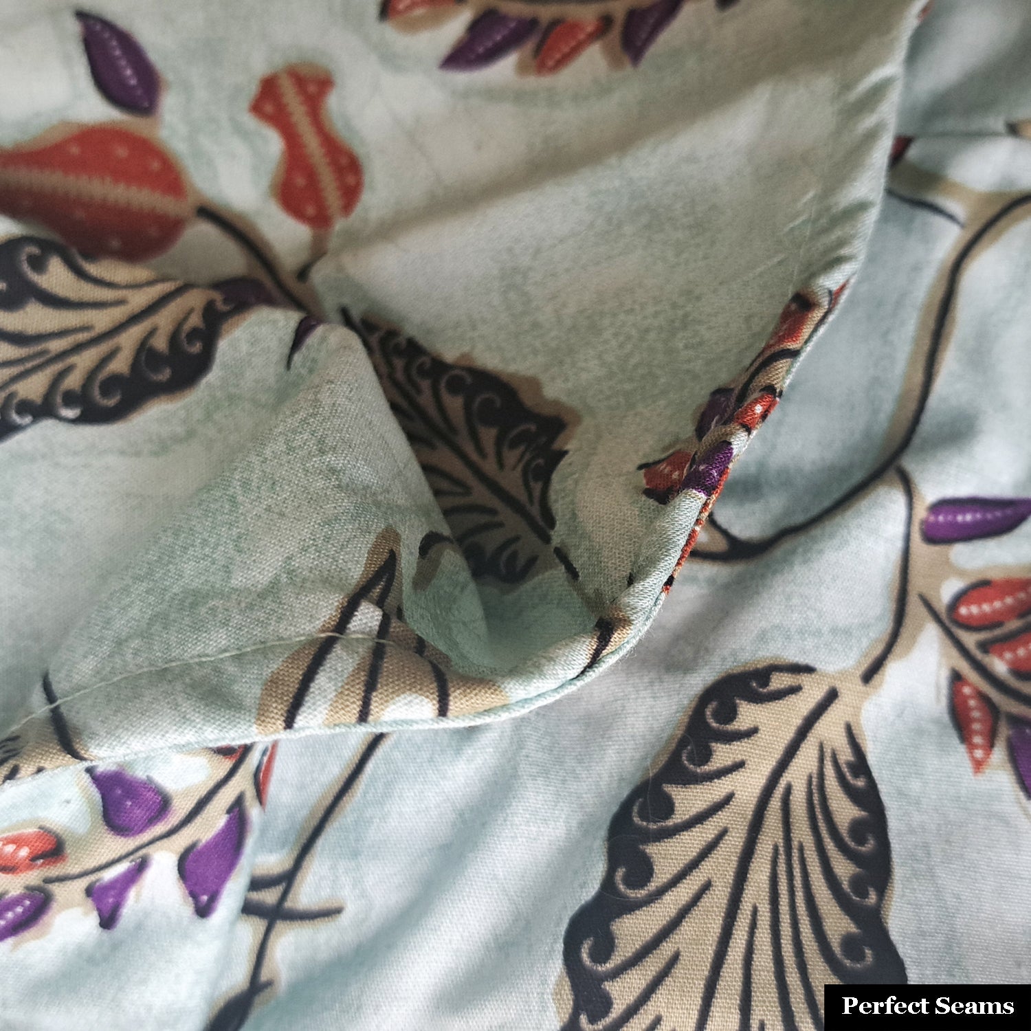 Modern batik blouse for ladies in Singapore. Toga, one sided blouse ladies top.