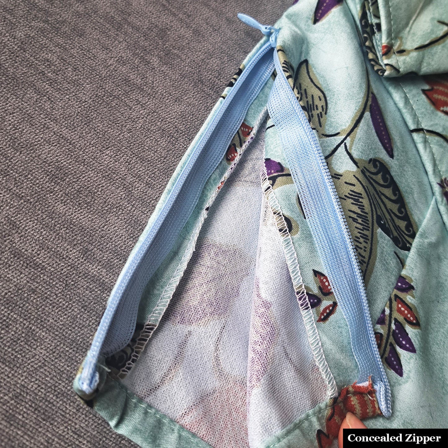 Modern batik blouse for ladies in Singapore. Toga, one sided blouse ladies top.