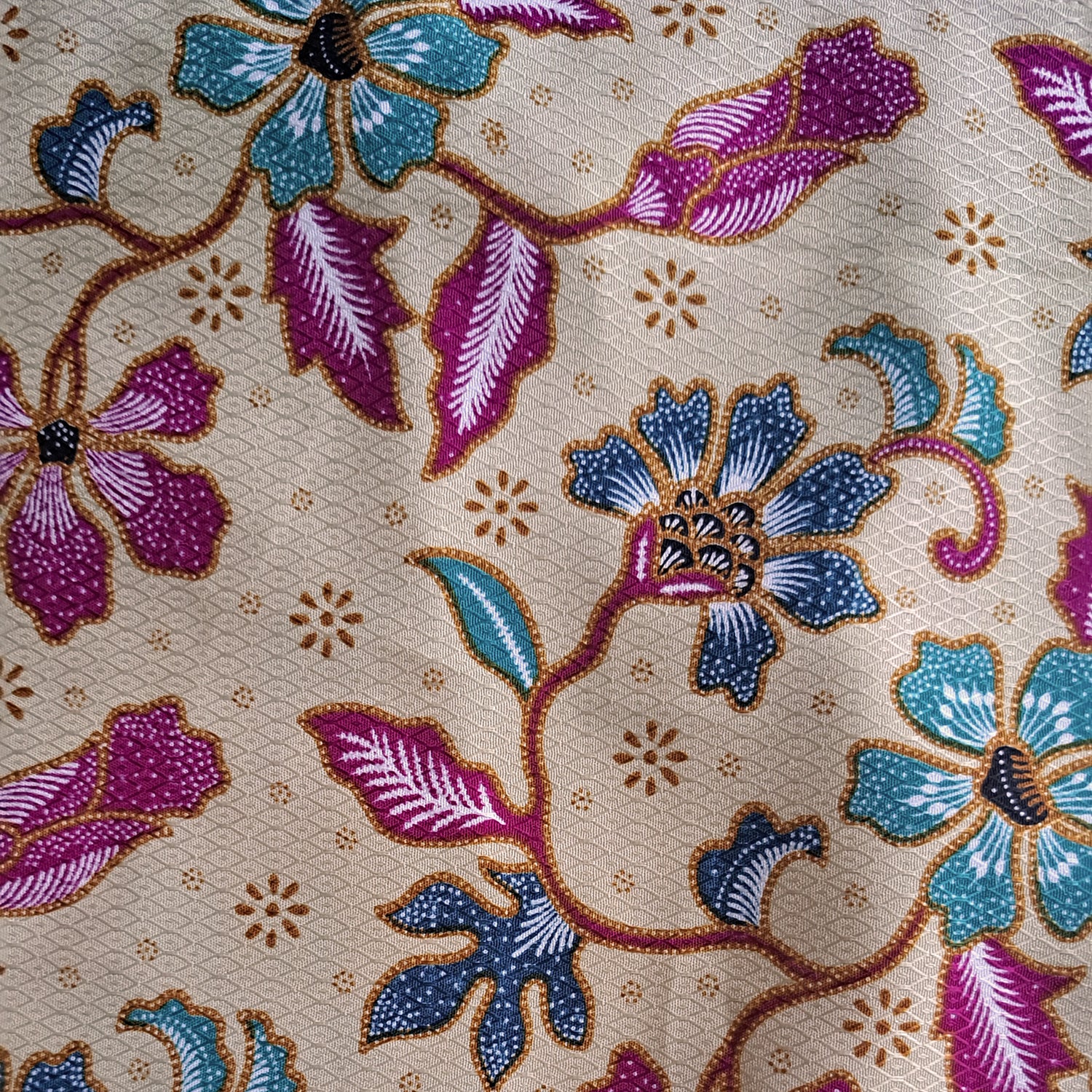 Modern batik blouse for ladies in Singapore. Halter neck, beautiful batik print. Pretty yet comfortable.