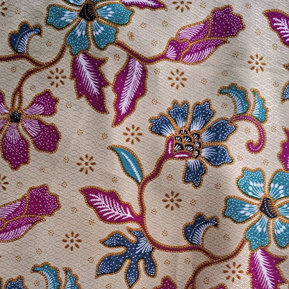 Modern batik blouse for ladies in Singapore. Halter neck, beautiful batik print. Pretty yet comfortable.